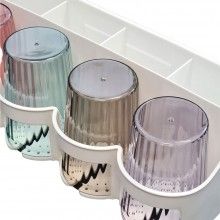 Organizator baie SIKS® cu carlige si dozator pentru pasta de dinti, alb Organizator baie SIKS® cu carlige si dozator pentru pasta de dinti, alb